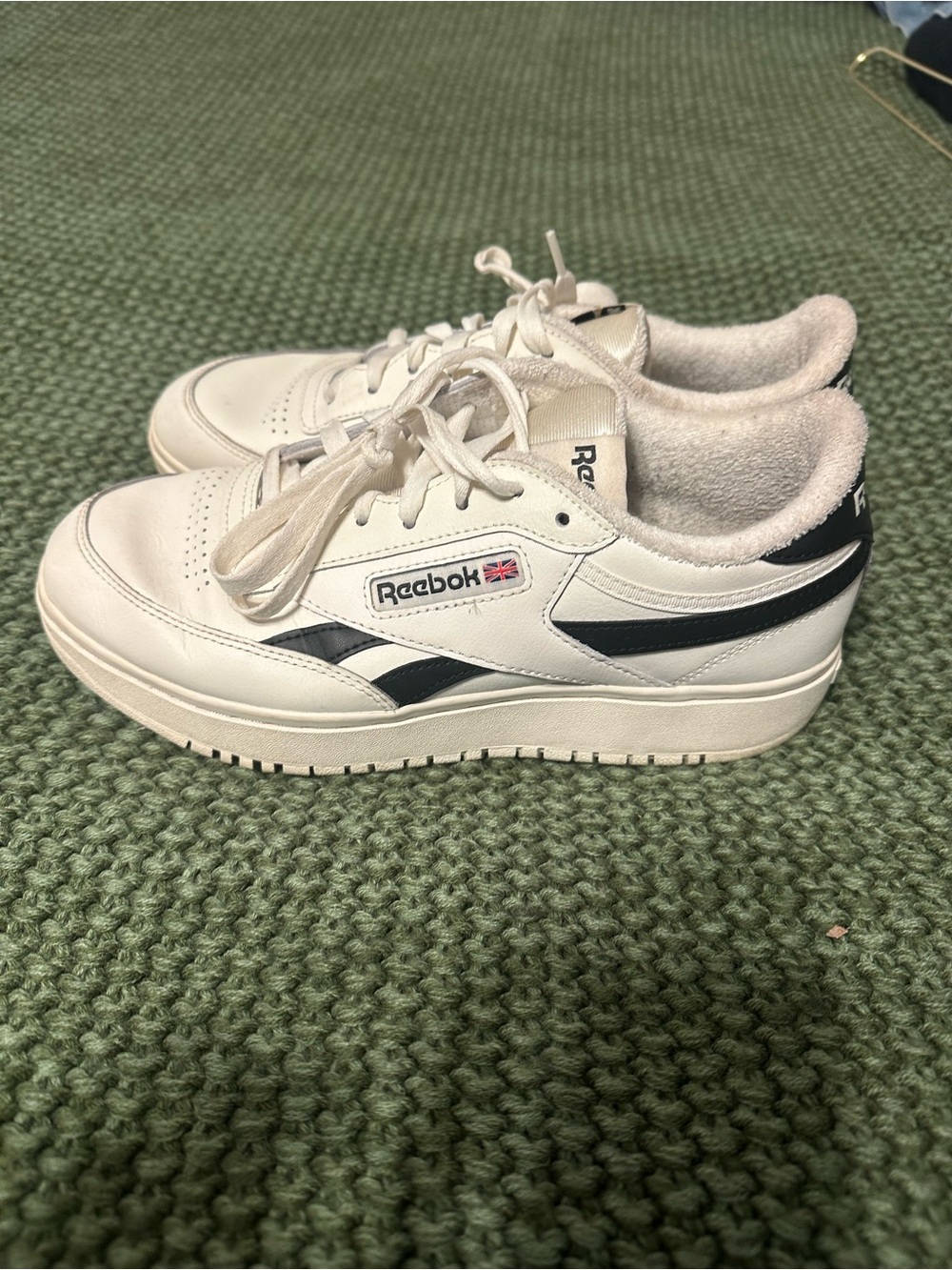 Reebok White Leather Sneakers with Black Stripes
